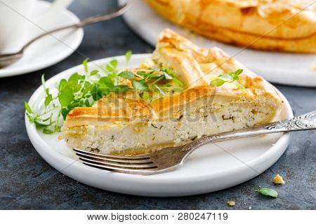 Pie With Salted Soft Cheese And Greens