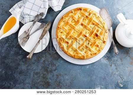 Pie With Salted Soft Cheese And Greens, Top View