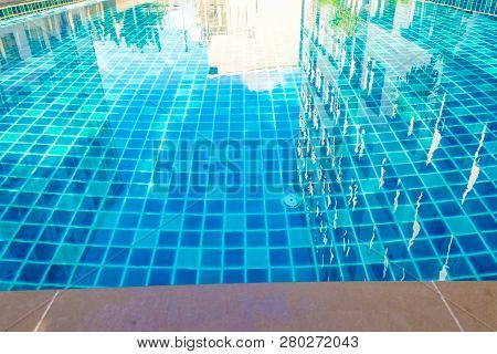 Luxury Smimming Pool Inside Of Low Rise Condominium Building