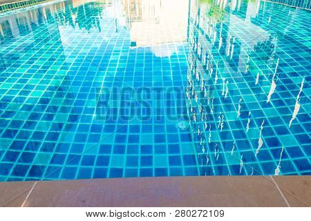 Luxury Smimming Pool Inside Of Low Rise Condominium Building