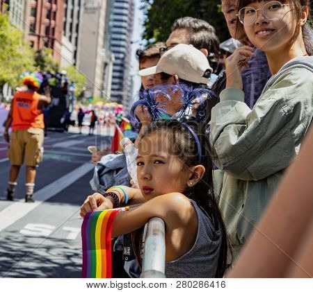 San Francisco, California, June 24, 2018:  Gay Pride Parade - Audience Watches Parade
