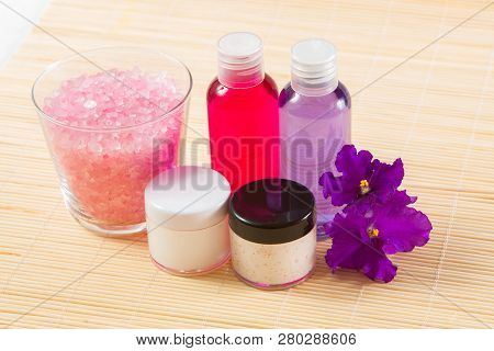 Face And Body Care Accessories On Bamboo Mat
