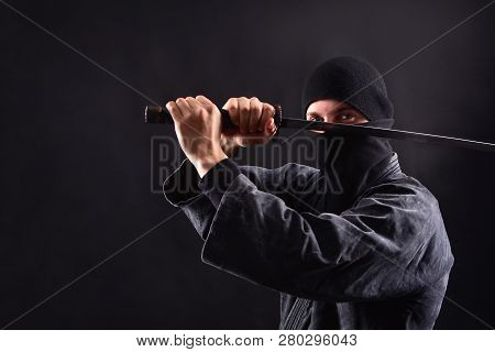 Ninja Samurai With Katana In Attack Pose