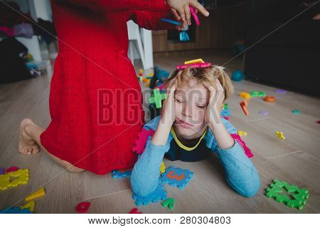 Kids Play At Home, Scattered Toys And Tired Exhausted Boy