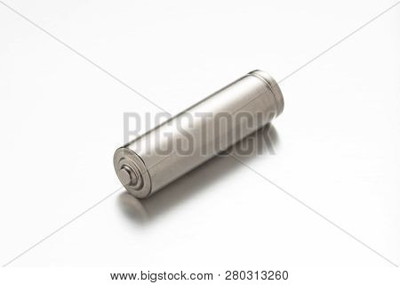 Universal Silver Battery On White Background With Reflection