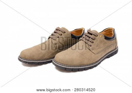 Brown suade shoes isolated on white background