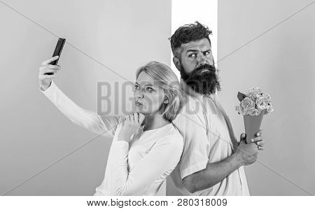 Sharing Happy Selfie. Woman Capturing Happy Moment Boyfriend Bring Bouquet Flowers. Capturing Moment