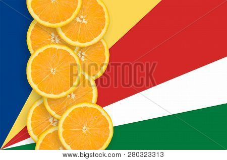 Seychelles Flag And Citrus Fruit Slices Vertical Row