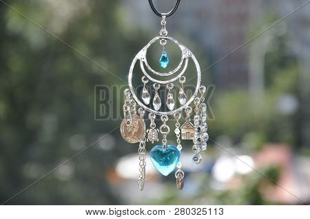 May The Luck Be With You. Luck Amulet Hung Out Outdoor. Name Amulet For Good Luck. Silver Amulet Wit