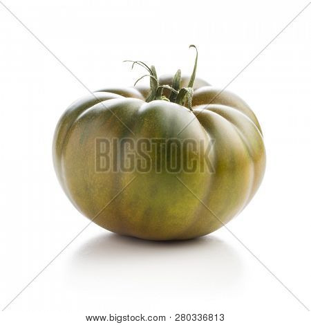 Dark brandywine tomato isolated on white background.