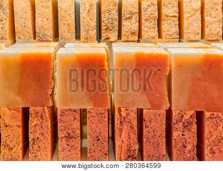 Bars Of Soap On A Shop Window. Ylang-ylang And Orange Soap With Natural Cedar Oil And Herbal Ingredi
