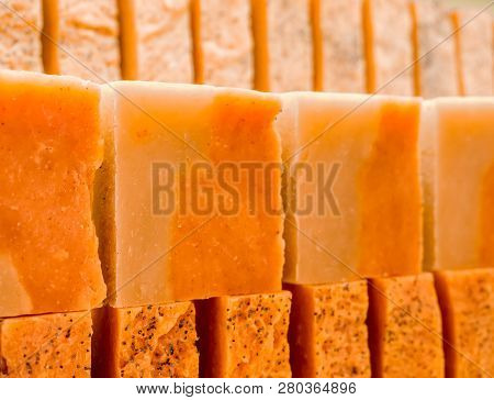 Bars Of Soap On A Shop Window. Ylang-ylang And Orange Soap With Natural Cedar Oil And Herbal Ingredi