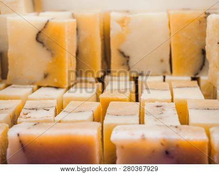 Bars Of Soap On A Shop Window. Orange Soap With Natural Cedar Oil And Herbal Ingredients. Handmade N