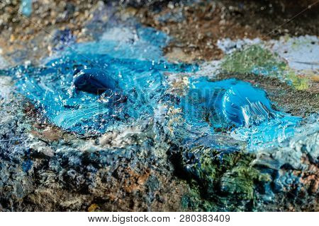 Oil Art Paints On A Very Old Palette. Close-up