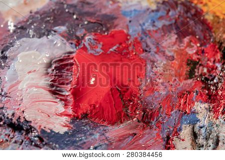 Oil Art Paints On A Very Old Palette. Close-up