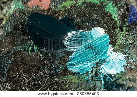 Oil Art Paints On A Very Old Palette. Close-up