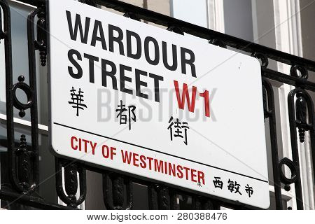 London, Uk - July 6, 2016: Wardour Street Sign In Chinatown District Of London, Uk. There Is A Minor