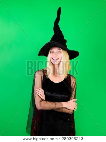 Pretty Happy Woman Dressed As Fairy With Crossed Arms. Smiling Fairy Enchantress In Witch Hat. Carni