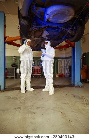 Crime Investigation - Collecting Of Evidences And Traces From Chassis Of Suspected Car In Police Gar
