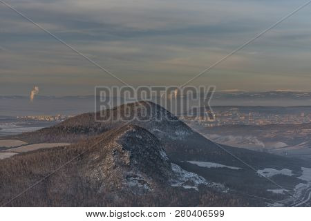Sunrise On Boren Hill Near Bilina Town In Winter Frosty Color Morning
