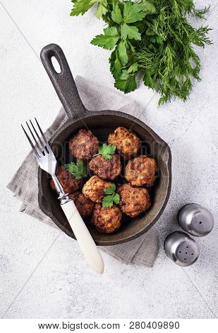 Homemade Beef Meatballs In Frypan On White Background