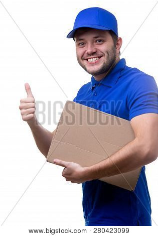 Photo Of Young Man In Blue T-shirt And Baseball Cap With Cardboard Box On White Blank Background