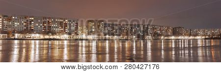 Night City View From The Frozen Reservoir / Panorama Of The Night City Of The Province Of Ukraine