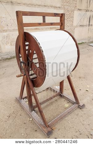 Foreground Of A Big Machine That By Friction Of A Drum And A Fabric Reproduce The Sound Of The Wind