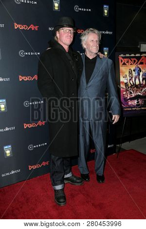 LOS ANGELES - JAN 22:  Jake Busey, Gary Busey at the 