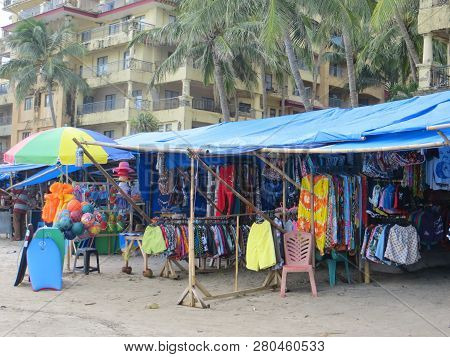 Anyer, Indonesia - June 26, 2018: Street Stalls Around The Sambolo Beach Anyer Selling Clothes And F