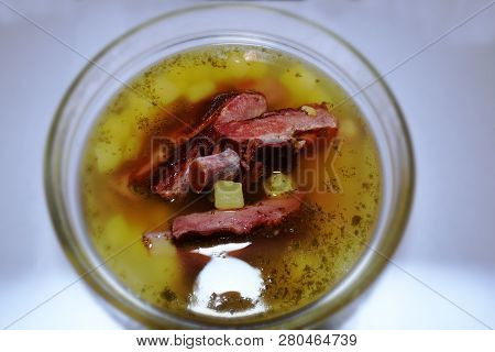 Pea Soup. Traditional Soup With Peas, Vegetables And Smoked Ribs Served In A Ceramic Plate. Wooden B