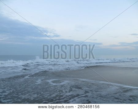 Anyer, Indonesia - June 27, 2018:  The Calm Sea Of Sunda Strait With Clear Blue Sky.