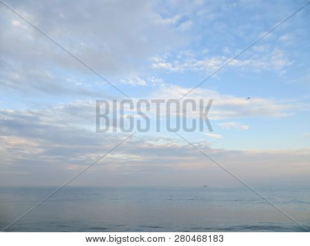 Anyer, Indonesia - June 27, 2018:  The Calm Sea Of Sunda Strait With Clear Blue Sky.