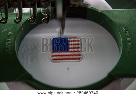 Close-up Of Embroidery Malaysia Logo With Wording Negaraku (my Country) On White Uniform