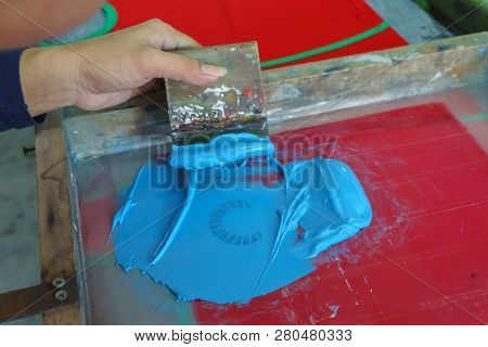 Screen Printing Shirt, Blue Color Is Printing On T-shirt With Hands Pressure