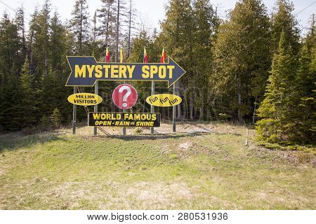 St. Ignace, Michigan, Usa - May 6, 2016: Billboard Sign For The Famous Mystery Spot In The Upper Pen