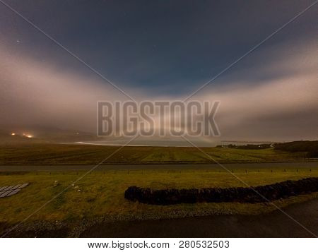 Very Rare Moonbow During The Night Above Staffin Bay