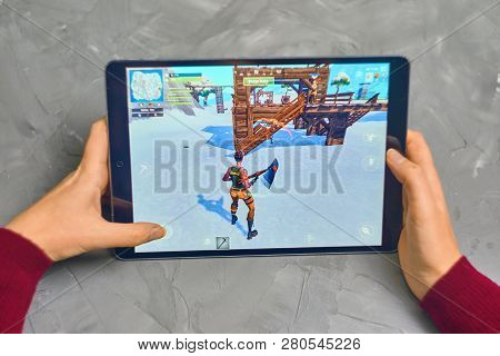 Bishkek, Kyrgyzstan - January 21, 2019: Woman Playing Fortnite Game Of Epic Games Company On Apple I