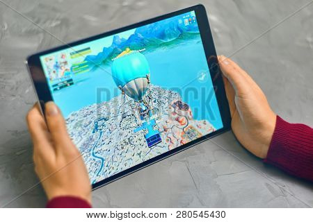 Bishkek, Kyrgyzstan - January 21, 2019: Woman Playing Fortnite Game Of Epic Games Company On Apple I