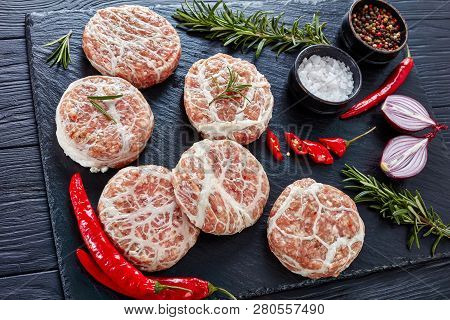 Raw Atriaux - Ground Pork Wrapped In Caul Fat, Swiss Cuisine, Type Of Bratwurst, Burgers On A Slate 