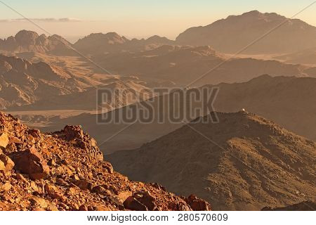 Picturesque Landscape Of Mountains Peaks During Sunrise. View From Mount Sinai (mount Horeb, Gabal M