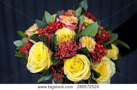 Stylish Beautiful Bouquet In Yellow And Coral Colors Of Roses, Jatropha Multifida And Other Plants I