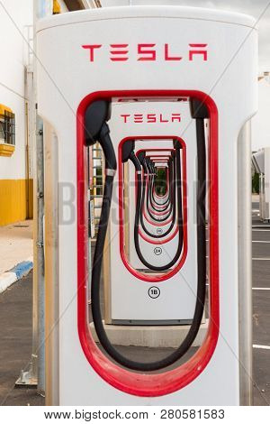 Aguadulce, Seville, Spain - April 29, 2018: A Tesla Electric Supercharger Stand At A Gas Station In 