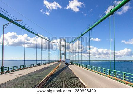 Driving Across Mackinaw Bridge. Four Lane Highway With Traffic On Interstate 75 Crossing The Mackina