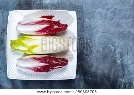 Food Background, Flat Lay Concept With Fresh Green Belgian Endive Or Chicory And Red Radicchio Veget