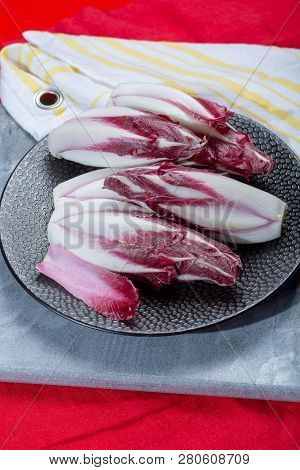 Group Of Fresh Red Radicchio Chicory Or Belgian Endive Vegetables, Also Known As Witlof Salade