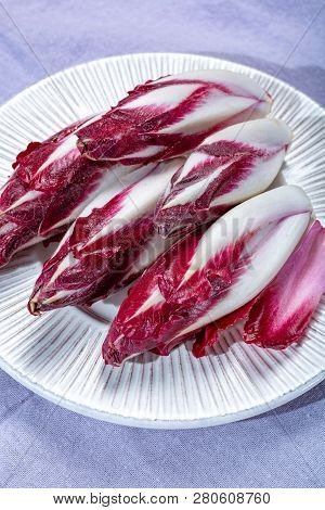 Group Of Fresh Red Radicchio Chicory Or Belgian Endive Vegetables, Also Known As Witlof Salade