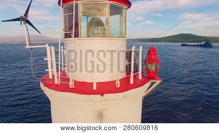 White Lighthouse With Red Roof On Tokarev Cat. Vladivostok, Russia