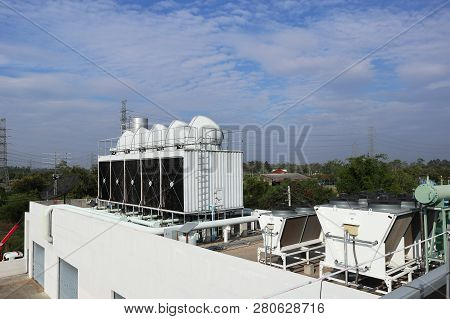 White Cooling Tower On The Roof Deck