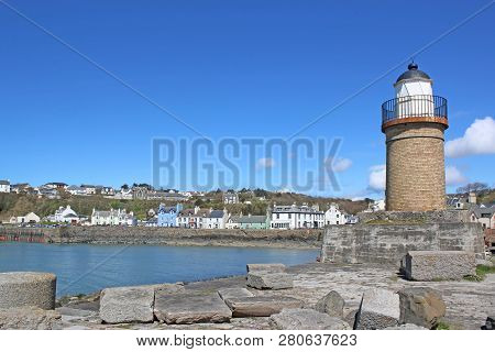 Portpatrick Village And Lighthouse In Galloway, Scotland